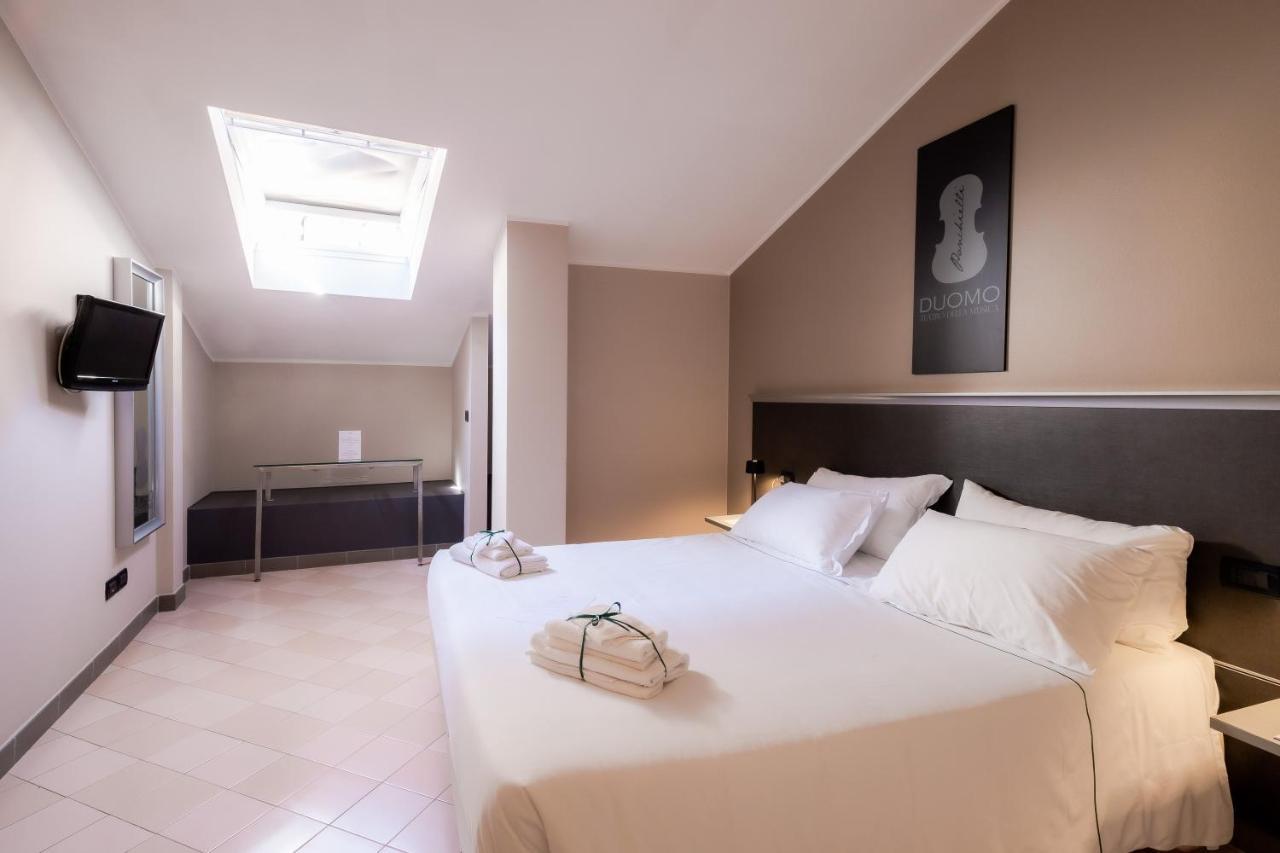 Hotel Duomo เกรโมนา ภายนอก รูปภาพ